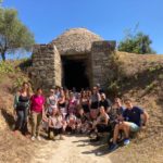 Group photo of students and tutors outside Tholos IV, Palace of Nestor, Pylos